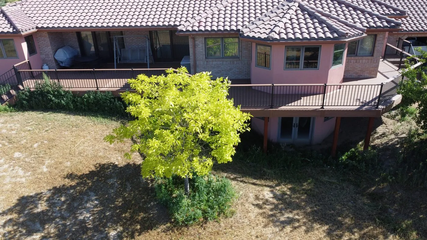 Low-angle aerial of a home exterior