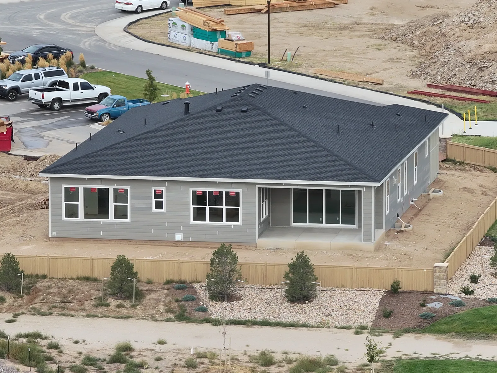 September 28 aerial detail of the neighboring house roof, windows and exterior
